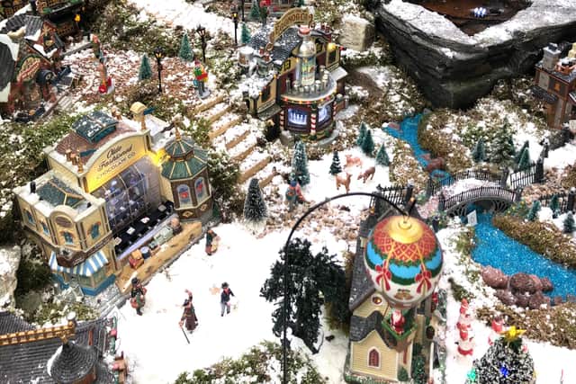 Christmas village display, complete with snow.