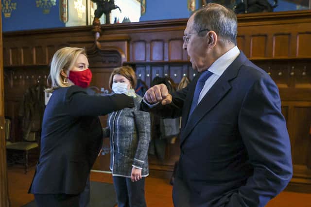 Russian foreign minister Sergey Lavrov (right) and British foreign secretary Liz Truss greet each other prior to their talks in Moscow. Picture: Russian Foreign Ministry Press Service via AP