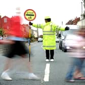 School crossing patrols are one of countless services in the firing line of councils tasked with balancing budgets. Picture: JPIMedia