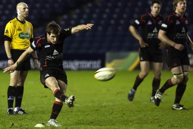 Godman kicks for goal during at match for Edinburgh in 2009.