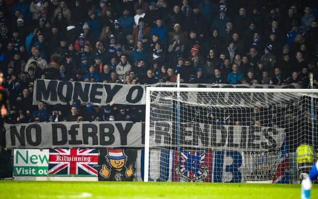 PERTH, SCOTLAND - MARCH 02: Rangers fans show a banner against the friendly in Australia during a Cinch Premiership match between St Johnstone and Rangers at McDiarmid Park, on March 02, in Perth, Scotland.  (Photo by Rob Casey / SNS Group)
