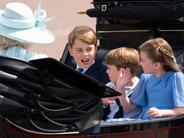 Prince George, Prince Louis and Princess Charlotte enjoy the ride in the carriage.