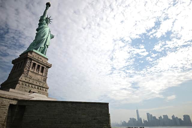 The Statue of Liberty has been associated with the benefits of immigration for more than a century (Picture: Johannes Eisele/AFP via Getty Images)