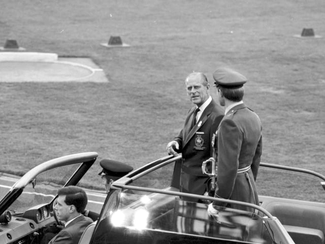 Prince Philip Duke of Edinburgh is driven round the track at the opening ceremony of the Edinburgh Commonwealth Games.