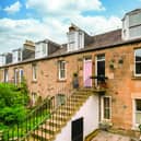 The two-level property has the enviable benefit of a private garden space