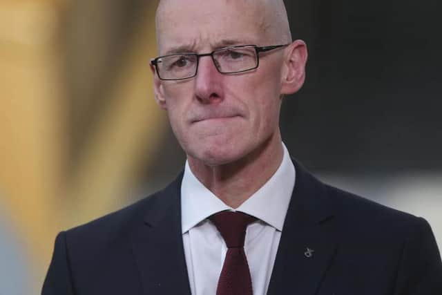 John Swinney addressed the Scottish Parliament on Tuesday.