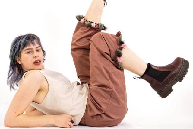 The trousers feature different trims, such as frills, tassels and pom-poms.