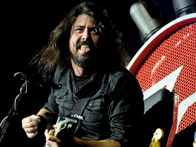 Dave Grohl is clearing enjoying himself as her performs at Murrayfield. Photo: Lisa Ferguson