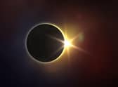 The eclipse will largely only be visible in the Southern Hemisphere, but there are still ways to watch in the UK. Photo: buradaki / Getty Images / Canva Pro.