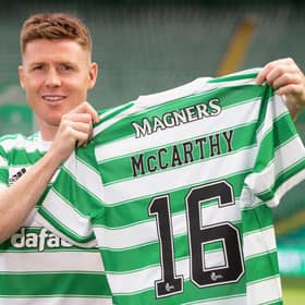 James McCarthy holds up the Celtic number he will now wear after joining his boyhood club...with 16 close to the number of year fans have spent asking him when he would make the move. (Photo by Craig Williamson / SNS Group)