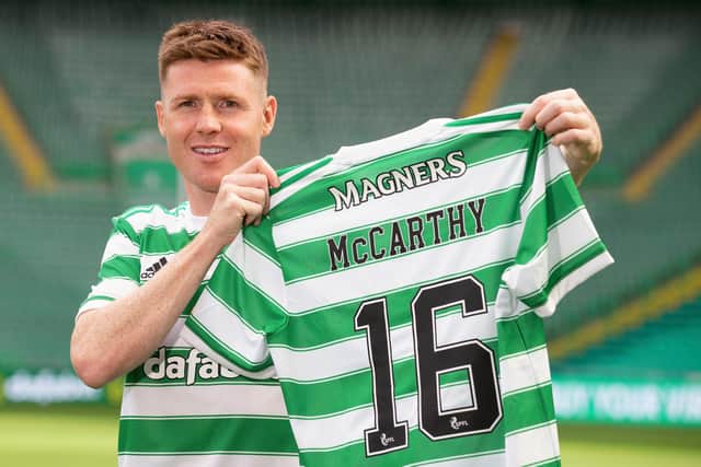 James McCarthy holds up the Celtic number he will now wear after joining his boyhood club...with 16 close to the number of year fans have spent asking him when he would make the move. (Photo by Craig Williamson / SNS Group)