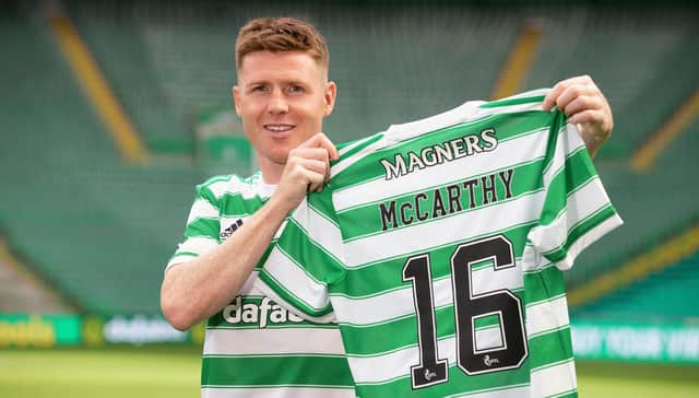 James McCarthy holds up the Celtic number he will now wear after joining his boyhood club...with 16 close to the number of year fans have spent asking him when he would make the move. (Photo by Craig Williamson / SNS Group)