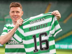 James McCarthy holds up the Celtic number he will now wear after joining his boyhood club...with 16 close to the number of year fans have spent asking him when he would make the move. (Photo by Craig Williamson / SNS Group)