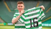 James McCarthy holds up the Celtic number he will now wear after joining his boyhood club...with 16 close to the number of year fans have spent asking him when he would make the move. (Photo by Craig Williamson / SNS Group)