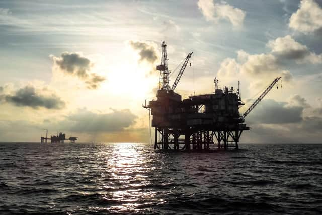 An offshore oil platform at sunset. Picture: Getty Images