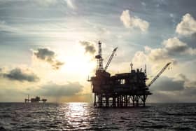 An offshore oil platform at sunset. Picture: Getty Images