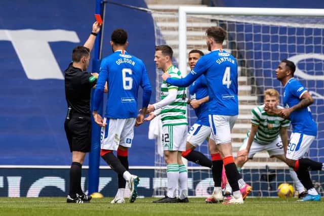 Celtic midfielder Callum McGregor is sent off for a second bookable offence committed in the build up to Rangers' second goal at Ibrox. (Photo by Craig Williamson / SNS Group)