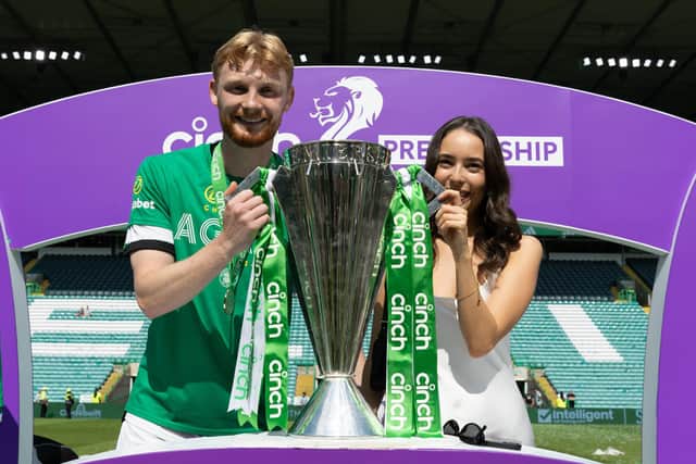Celtic's Liam Scales with his partner and the cinch Premiership trophy. (Photo by Craig Williamson / SNS Group)