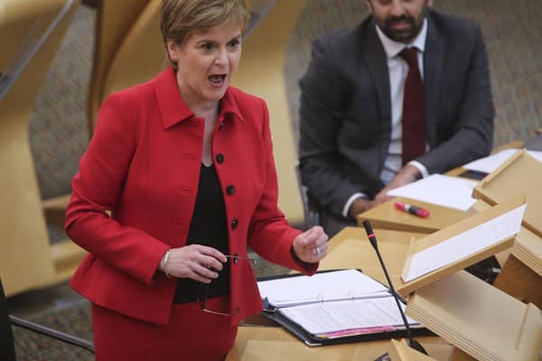 Former first minister Nicola Sturgeon alongside her successor Humza Yousaf during an update to MSPs on changes to the Covid-19 restrictions at the Scottish Parliament. Picture: PA