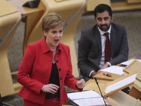 Former first minister Nicola Sturgeon alongside her successor Humza Yousaf during an update to MSPs on changes to the Covid-19 restrictions at the Scottish Parliament. Picture: PA
