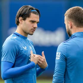 Although cut from Rangers' European squad, Ianis Hagi was in training at the Rangers Academy on Monday. Here he speaks to Nicolas Raskin (Photo by Craig Williamson / SNS Group)