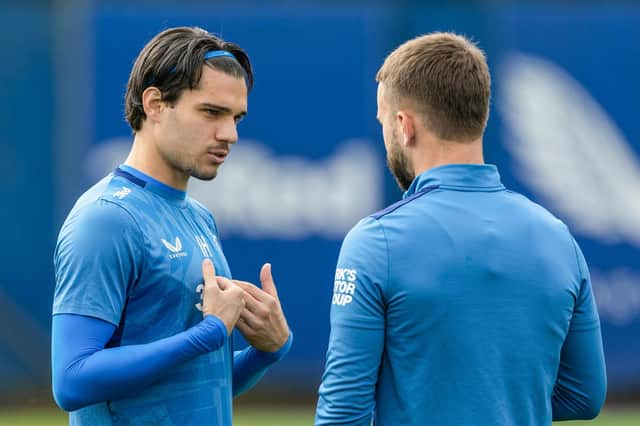 Although cut from Rangers' European squad, Ianis Hagi was in training at the Rangers Academy on Monday. Here he speaks to Nicolas Raskin (Photo by Craig Williamson / SNS Group)