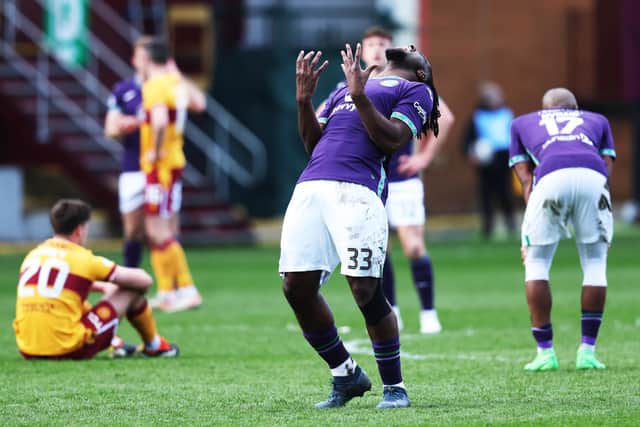 Hibs' Rocky Bushiri reacts after full-time whistle.