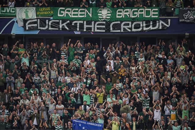 Fans of Celtic display a flag against the crown during the midweek Champions League match against Shakhtar Donetsk in Warsaw. (Photo by Adam Nurkiewicz/Getty Images)