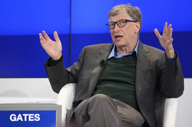 Bill Gates has been forced to deny he's involved in a bizarre plot to implant tracking devices in every human being on the planet (Picture: Gian Ehrenzeller/Keystone via AP)