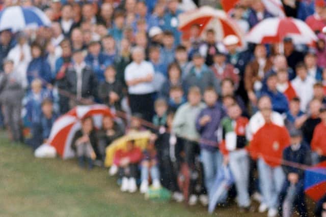 Waring his Saltire sweater, Colin Montgomerie is watched by a huge gallery in the final round of the 1992 Bell's Scottish Open on the King's Course at Gleneagles. Picture: Ted Blackbrow/Daily Mail/Shutterstock.