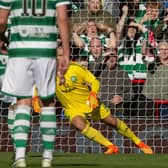 Steven Gerrard scores from the spot for Liverpool against Celtic in a charity match at Anfield.