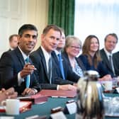 Prime Minister Rishi Sunak (centre), alongside the Chancellor of the Exchequer, Jeremy Hunt (centre right), holds his first Cabinet meeting in Downing street.