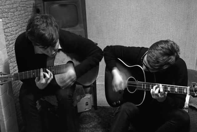 Sir Paul McCartney and John Lennon writing I Saw Her Standing There
