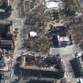 This satellite image provided by Maxar Technologies on Saturday, March 19, 2022 shows the aftermath of the airstrike on the Mariupol Drama theatre, Ukraine,