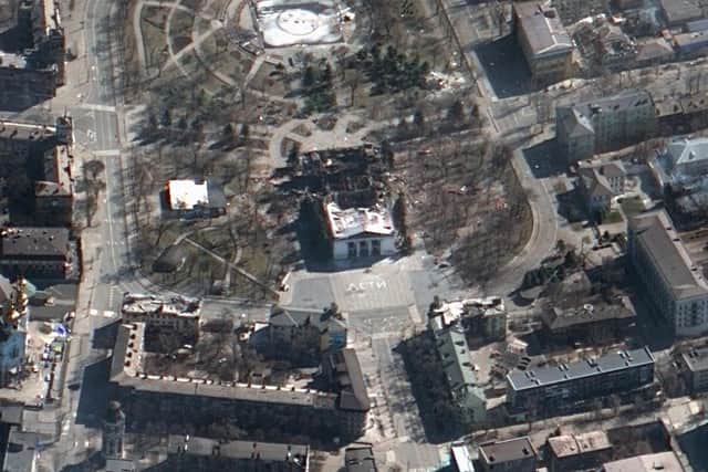This satellite image provided by Maxar Technologies on Saturday, March 19, 2022 shows the aftermath of the airstrike on the Mariupol Drama theatre, Ukraine,