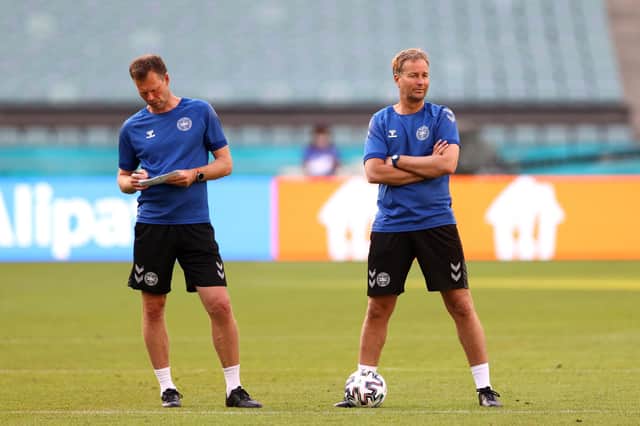 Denmark manager Kasper Hjulmand looks on next to Morten Wieghorst, his assistant, at a training session before the Euro 2020 quarter-final win over Czech Republic on Saturday (Photo by Naomi Baker/Getty Images)