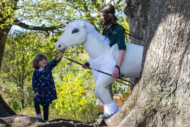 Four-year-old Rosa Kirby with The Unicon, who will be appearing in Family Encounters, the outdoors strand of this year's festival.