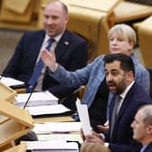 Humza Yousaf reacts as he answers questions during First Minister's Questions at the Scottish Parliament. Picture: Jeff J Mitchell/Getty Images