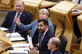 Humza Yousaf reacts as he answers questions during First Minister's Questions at the Scottish Parliament. Picture: Jeff J Mitchell/Getty Images