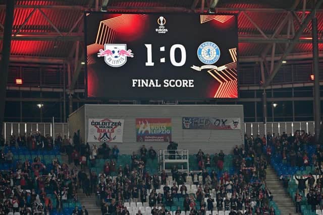 The final score between RB Leipzig and Rangers is seen on the display at Red Bull Arena. (Photo by JOHN MACDOUGALL/AFP via Getty Images)