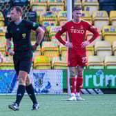 Aberdeen's Dante Polvara (left) and Angus MacDonald (right) look dejected as Bojan Miovski's goal against Livingston is ruled offside. (Photo by Sammy Turner / SNS Group)
