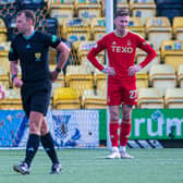 Aberdeen's Dante Polvara (left) and Angus MacDonald (right) look dejected as Bojan Miovski's goal against Livingston is ruled offside. (Photo by Sammy Turner / SNS Group)