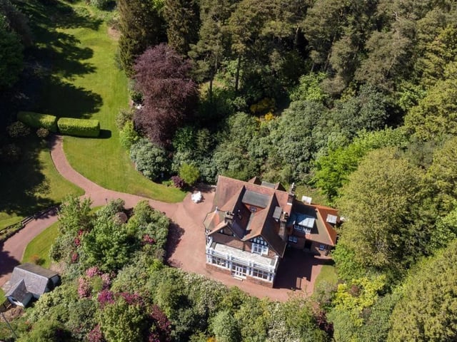 Aerial view of house and grounds.