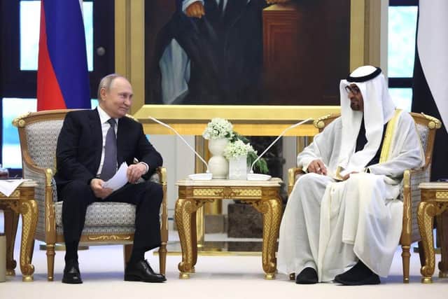 Russia's President Vladimir Putin and President of the United Arab Emirates Sheikh Mohamed bin Zayed Al Nahyan holding a meeting in Abu Dhabi on Wednesday. Mr Putin will also meet Saudi Arabia's de facto ruler, Crown Prince Mohammed bin Salman.