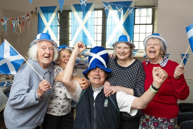 Group enjoying the festivities at Asda Maryhill event.