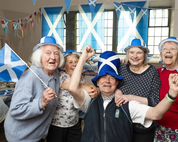 Group enjoying the festivities at Asda Maryhill event.