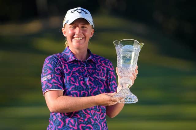 Gemma Dryburgh shows off the trophy after winning the TOTO Japan Classic by four shots. Picture: Yoshimasa Nakano/Getty Images.