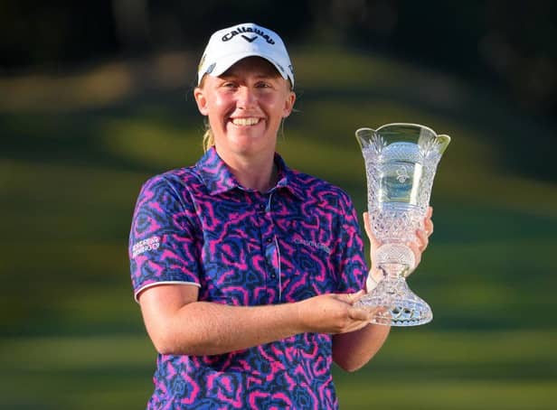 Gemma Dryburgh shows off the trophy after winning the TOTO Japan Classic by four shots. Picture: Yoshimasa Nakano/Getty Images.