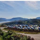 A car rally assembles before crossing the Kylesku Bridge on the NC500. PIC: Contributed.