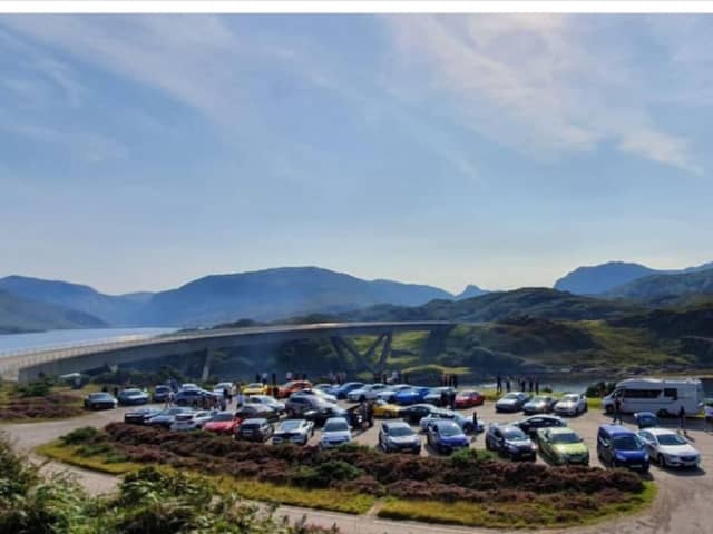 A car rally assembles before crossing the Kylesku Bridge on the NC500. PIC: Contributed.
